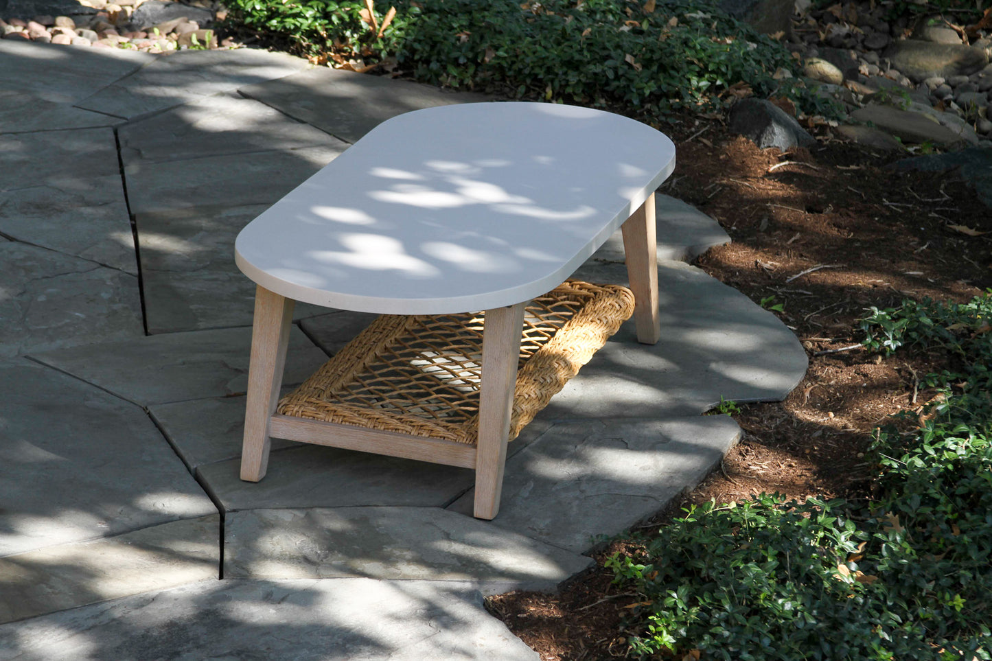 Sahara Outdoor Oval Ivory Composite Coffee Table 51" x 25"