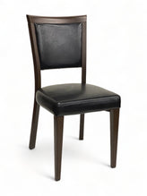 Upholstered Black Vinyl Chair with Wood Grain Metal Frame