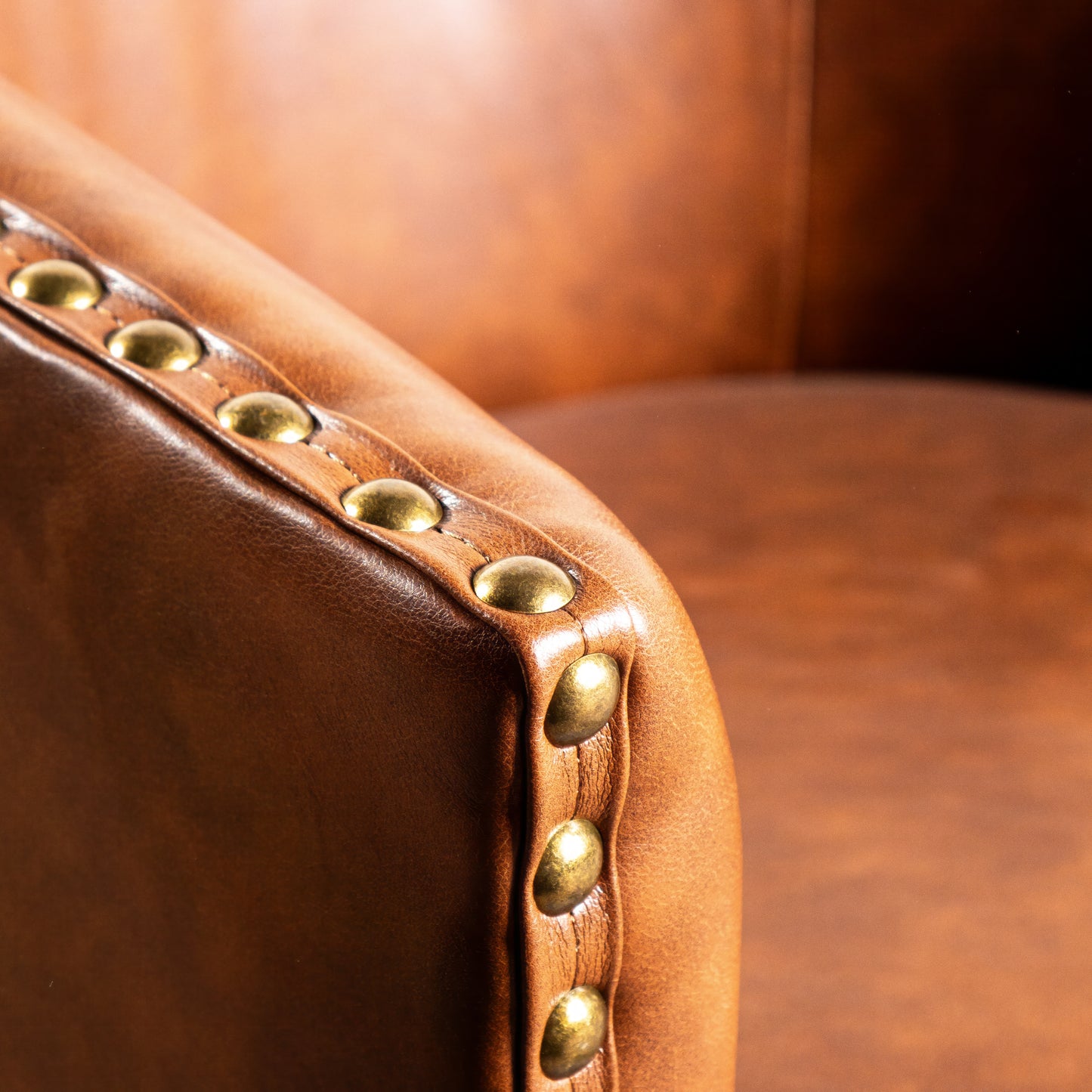 Myles Club Style Commercial Barrel Accent Armchair with 360° Swivel Metal Base and Brown Leathersoft Upholstery with Brass Decorative Nail Head Trim