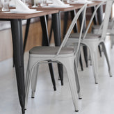 Perry Commercial Grade White Metal Indoor-Outdoor Stackable Chair with Gray Poly Resin Wood Seat