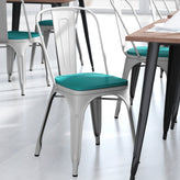 Perry Commercial Grade White Metal Indoor-Outdoor Stackable Chair with Mint Green Poly Resin Wood Seat