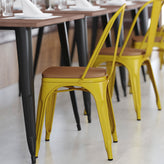 Perry Commercial Grade Yellow Metal Indoor-Outdoor Stackable Chair with Teak Poly Resin Wood Seat