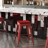 Kai Commercial Grade 24" High Backless Red Metal Indoor-Outdoor Counter Height Stool with Red Poly Resin Wood Seat