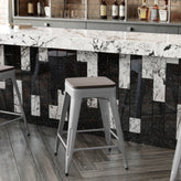 Kai Commercial Grade 24" High Backless Silver Metal Indoor-Outdoor Counter Height Stool with Gray Poly Resin Wood Seat