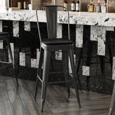 Kai Commercial Grade 30" High Black Metal Indoor-Outdoor Bar Height Stool with Removable Back and Black All-Weather Poly Resin Seat