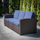 Seneca Brown Faux Rattan Sofa with All-Weather Navy Cushions