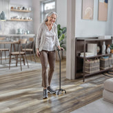 HERCULES Adjustable Quad Cane with Comfort Grip Foam Padded Handle, Large 4-Pronged Base for Stability, and Left or Right Handed Use in Black