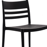Bridgeport Indoor-Outdoor Stacking Patio Chair with Slatted Backrest, Commercial All-Weather Resin Chair in Black