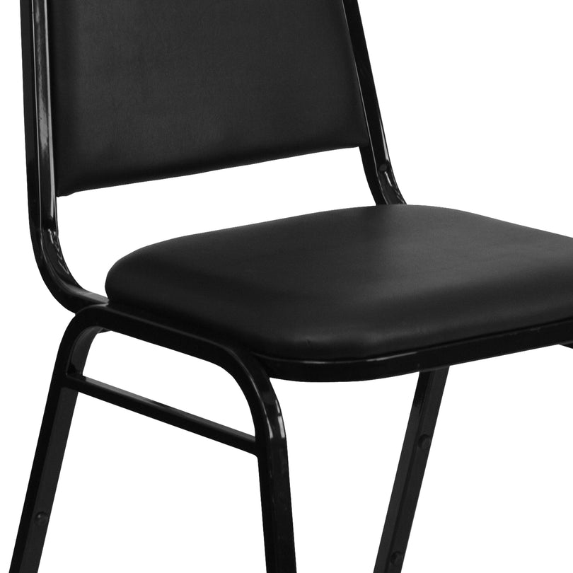 HERCULES Series Trapezoidal Back Stacking Banquet Chair in Black Vinyl - 1-1/2" Thick Seat