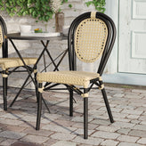 Cannes Indoor/Outdoor Commercial Thonet Bistro Stacking Chair, Natural PE Cane Rattan and Black Aluminum Frame