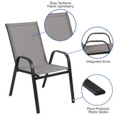 Brazos 7 Piece Outdoor Patio Dining Set - 55" Tempered Glass Patio Table with Umbrella Hole, 6 Gray Flex Comfort Stack Chairs