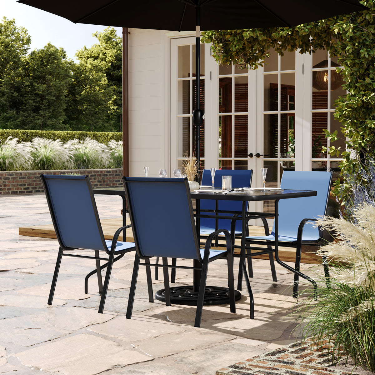 Brazos 5 Piece Outdoor Patio Dining Set - 55" Tempered Glass Patio Table with Umbrella Hole, 4 Navy Flex Comfort Stack Chairs