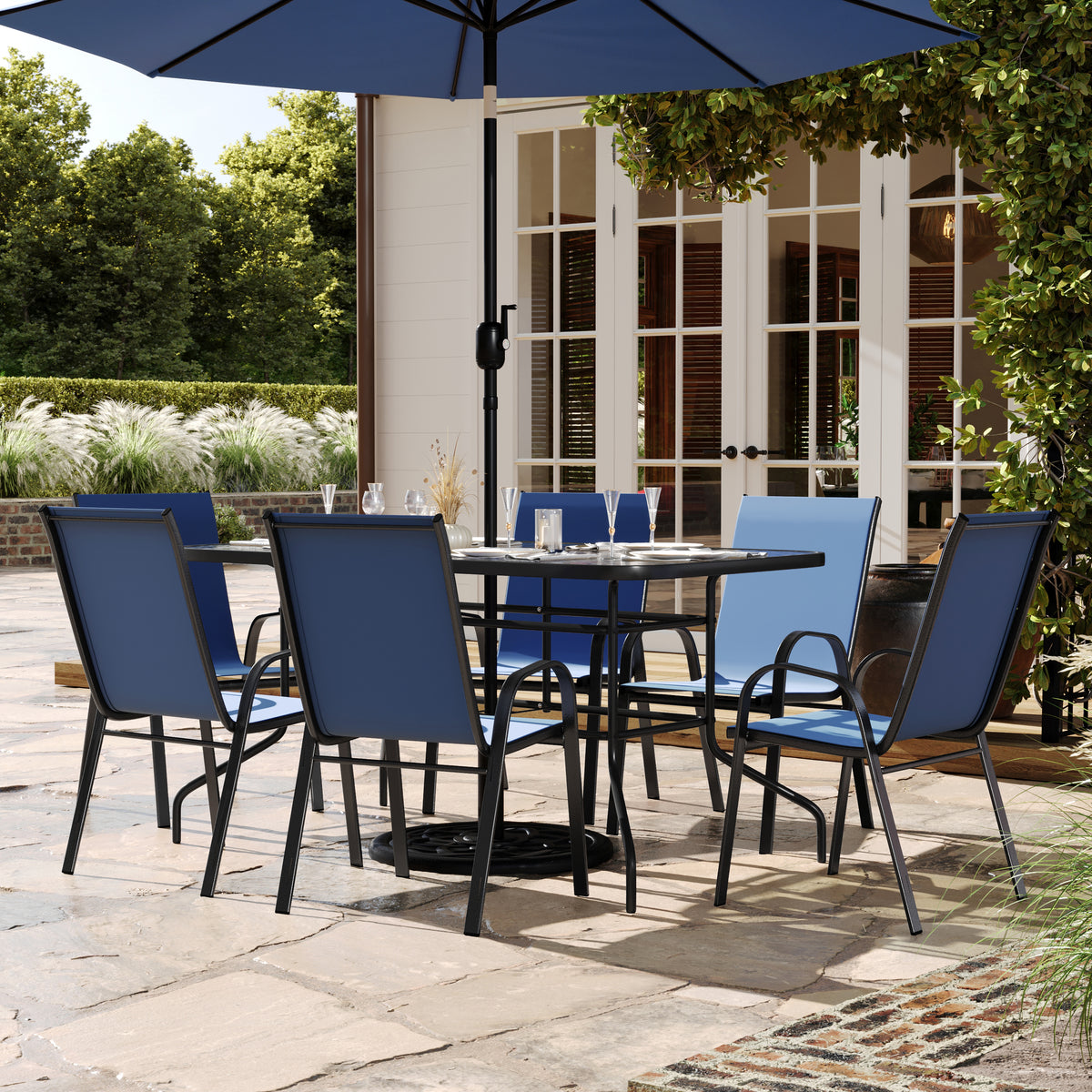 Brazos 7 Piece Outdoor Patio Dining Set - 55" Tempered Glass Patio Table with Umbrella Hole, 6 Navy Flex Comfort Stack Chairs