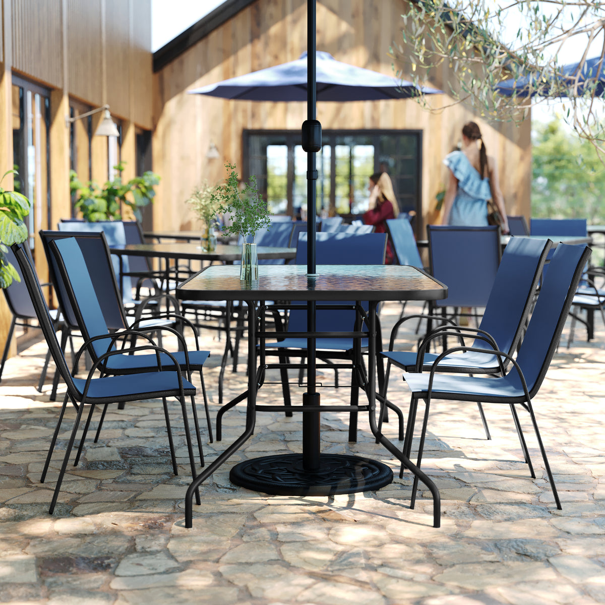 Brazos 7 Piece Outdoor Patio Dining Set - 55" Tempered Glass Patio Table with Umbrella Hole, 6 Navy Flex Comfort Stack Chairs