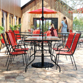 Brazos 5 Piece Outdoor Patio Dining Set - 55" Tempered Glass Patio Table with Umbrella Hole, 4 Red Flex Comfort Stack Chairs