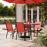 Brazos 5 Piece Outdoor Patio Dining Set - 55" Tempered Glass Patio Table with Umbrella Hole, 4 Red Flex Comfort Stack Chairs