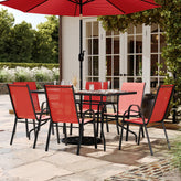 Brazos 7 Piece Outdoor Patio Dining Set - 55" Tempered Glass Patio Table with Umbrella Hole, 6 Red Flex Comfort Stack Chairs
