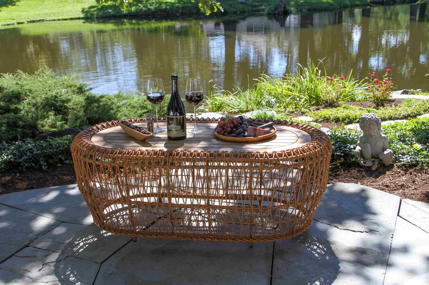 On the Vine Teak and Wicker Outdoor Oval Coffee Table 47" x 27"
