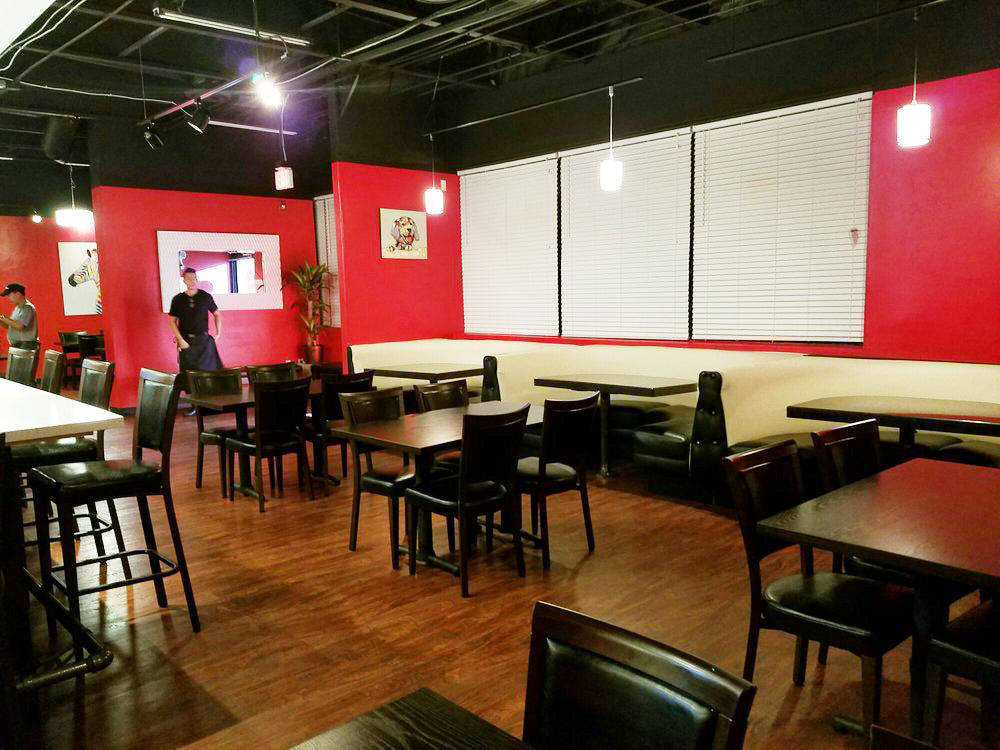 Upholstered Black Vinyl Chair with Wood Grain Metal Frame