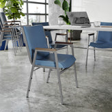 HERCULES Heavy Duty Navy Vinyl Stack Chair with Arms
