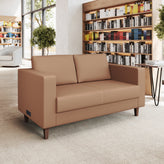 HERCULES Artemis Cognac LeatherSoft Reception Loveseat with 2 AC Outlets/1 USB/1 USB-C Ports and Solid Wood Walnut Legs with Adjustable Floor Glides