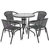 28 inch round glass metal table with gray rattan edging and 4 gray rattan stack chairs